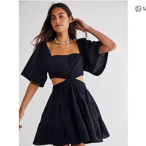 Leani Elegant Black Dress with Ruffled Sleeves size small.